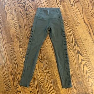 Tavi Noir small olive green laser cut tight EUC